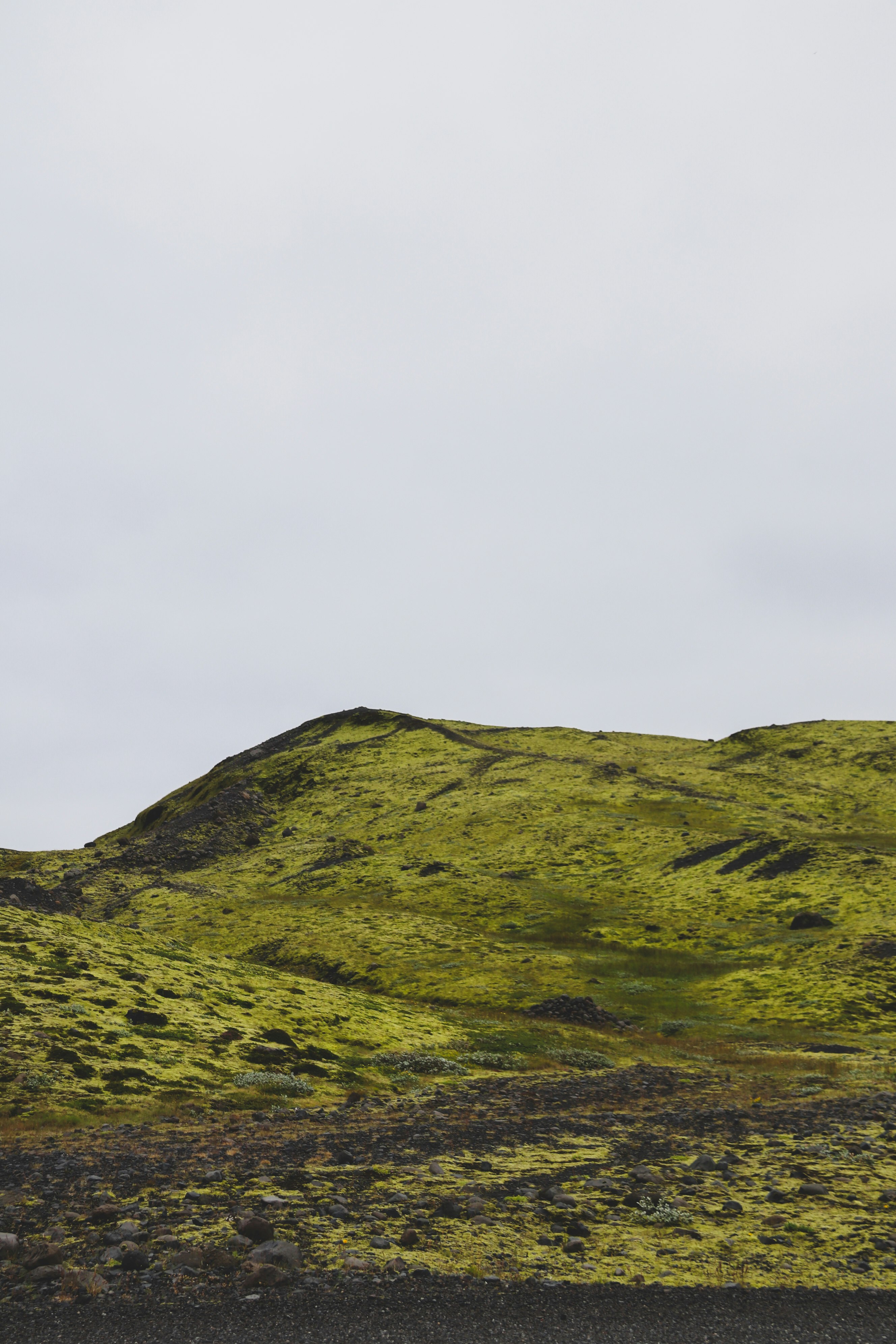 green mountain under white sky during daytime